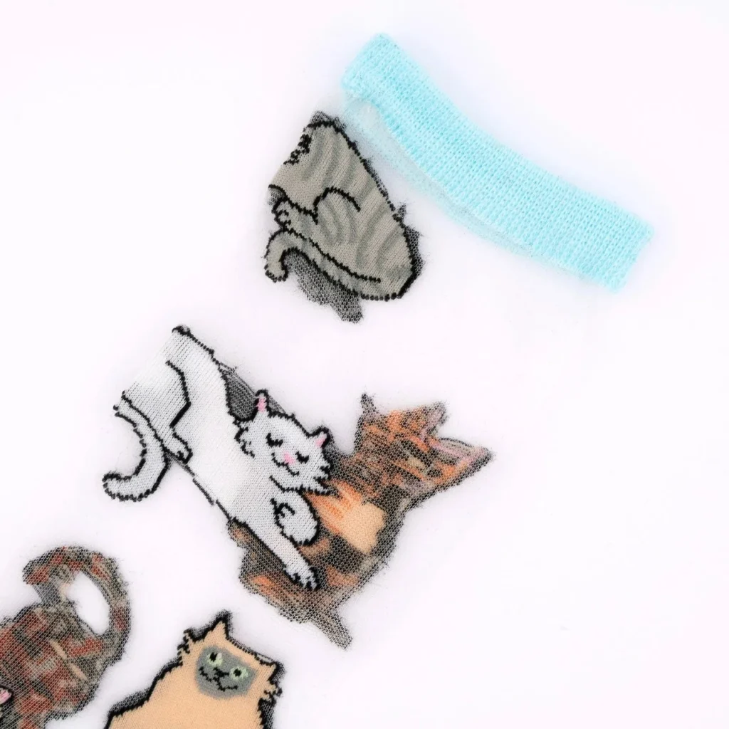 Caurspīdīgas zeķes Meow | Coucou Suzette