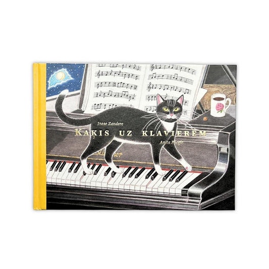 Kaķis uz klavierēm